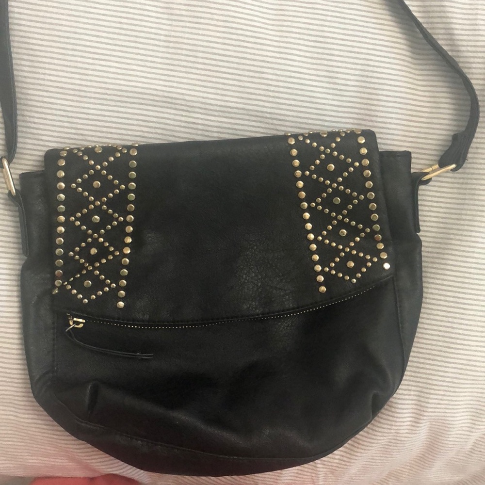 Black crossbody handbag with gold studs